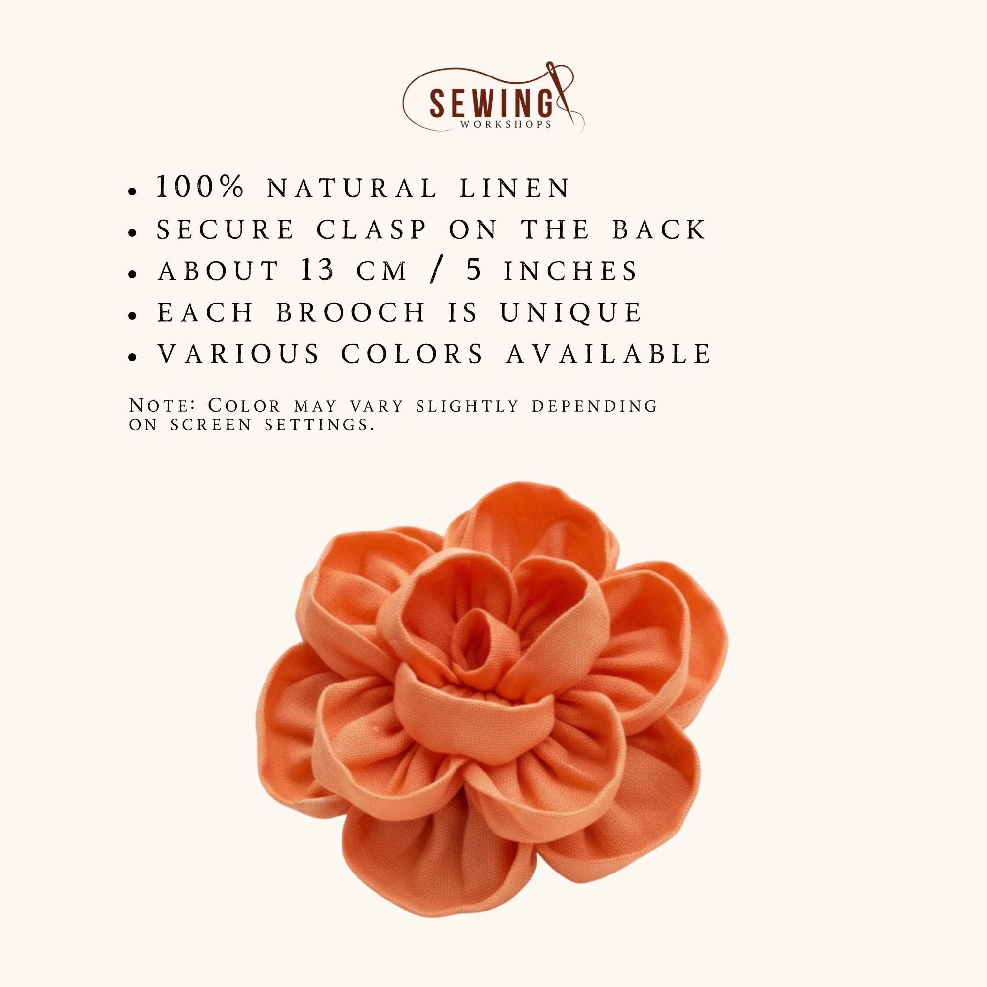 Oranžinės lininės gėlės sagės informacinė grafika: 100% natūralus linas, saugus užsegimas, apie 13 cm, unikali, įvairios spalvos